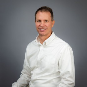 Man wearing a white collared shirt