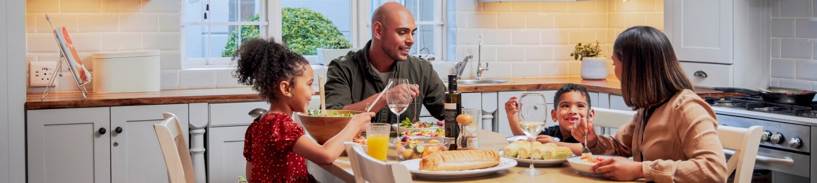 family eating at dinner table